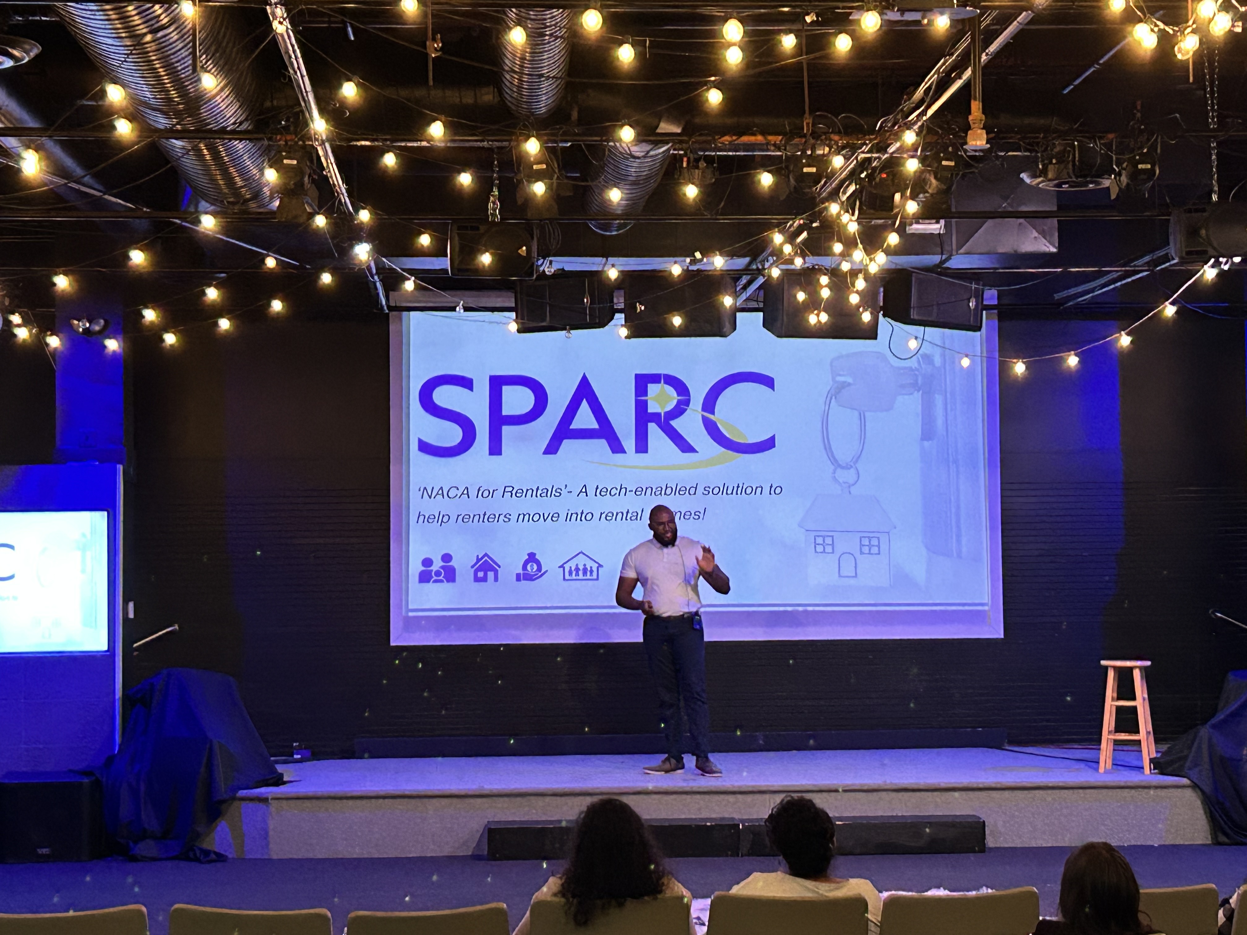 Audience view as Martika presents at a Tampa event.